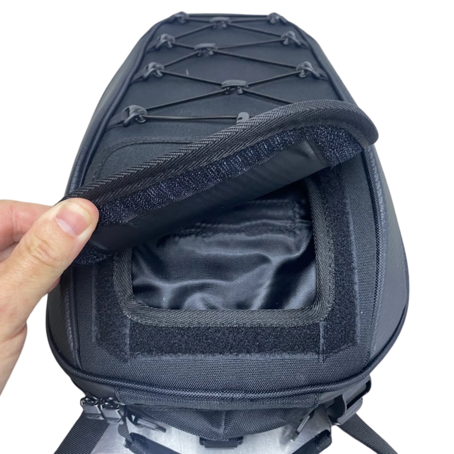 Organized compartments inside motorcycle tail bag for touring essentials
